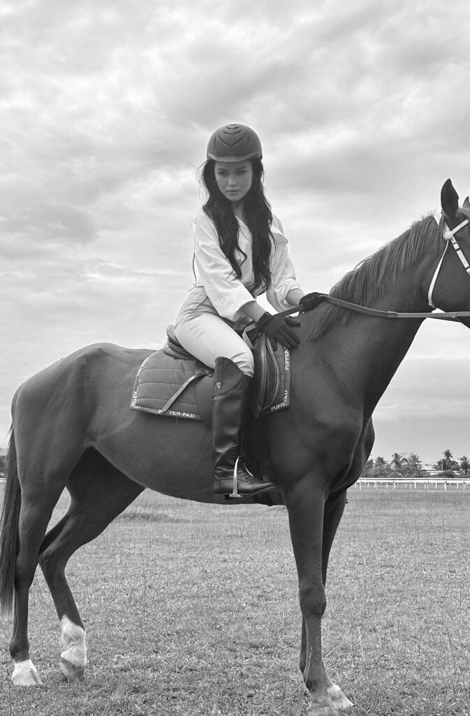 Brenda Anura Londoh on horseback